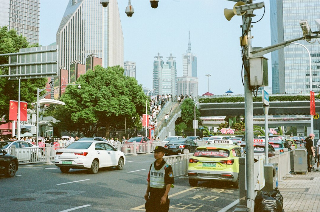 people walking on busy street