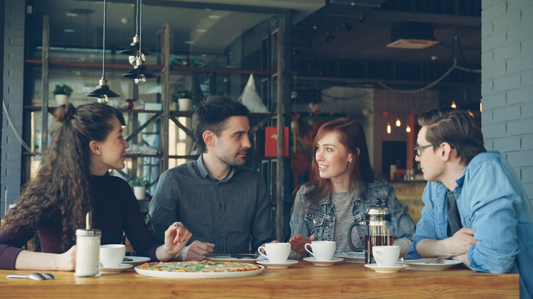 people chatting in cafe