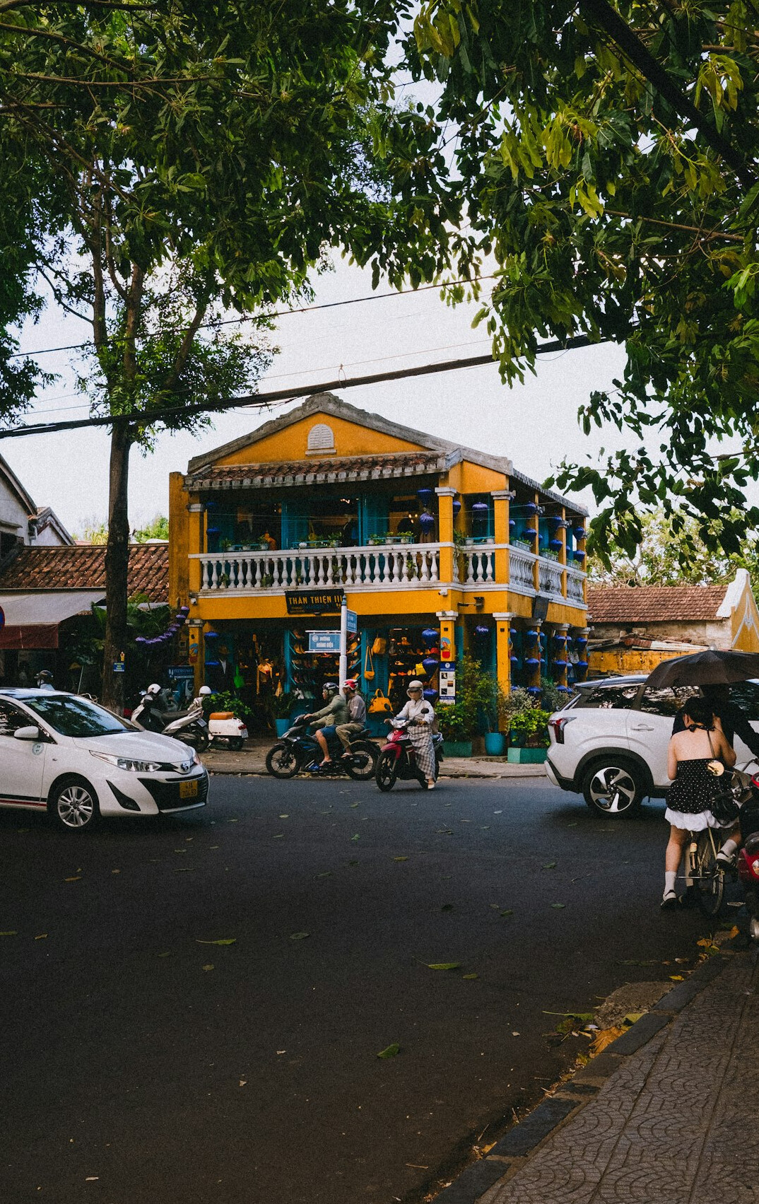 old woman on balcony